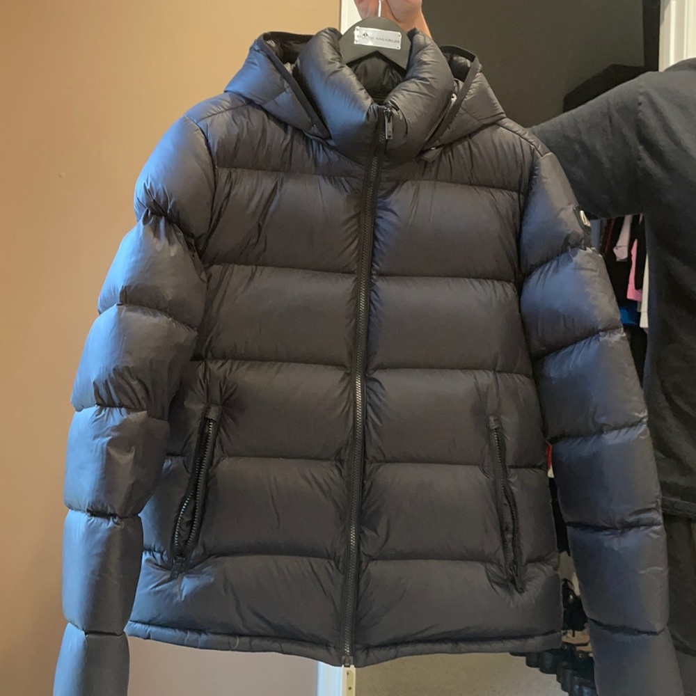 Moose knuckles black puffer jacket. Worn once too big. AMAZING condition